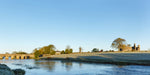 An early morning shot of Bective Abbey and Bective Bridge in the sunshine along the River Boyne.