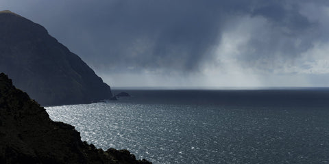 A dark and moody rain cloud comig in over Clare Island from the Atlantic.