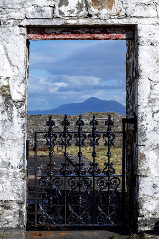 Craogh Patrick through a gateway at Clare Island Lighthouse.