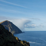 A dramatic cloud on the Atlantic Ocean at Clare Island Lighthouse.