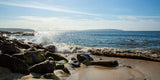 The wave crashing against the rocks at Portstewart.