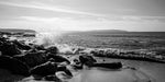 The waves crashing against the rocks at Portstewart.