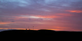 A gorgeous blue and pink sky at the Hill of Tara towards the Lia Fáil and memorial headstone.