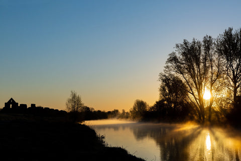 A beautiful sunrise over the River Boyne at the ruins at Newtown, Trim. Irish Landscape Photo.